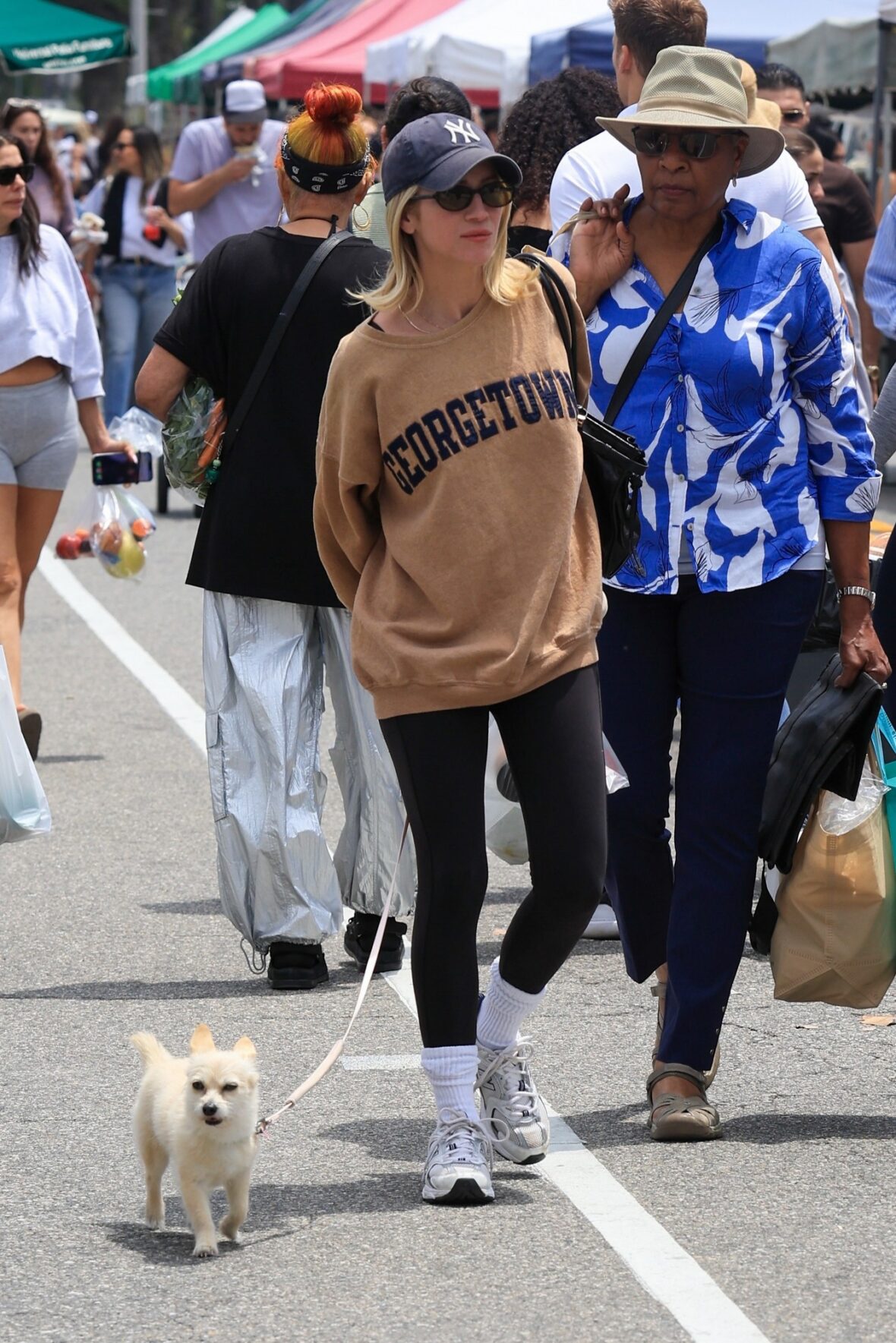 Brittany Snow and Hunter Moreno at a farmers market