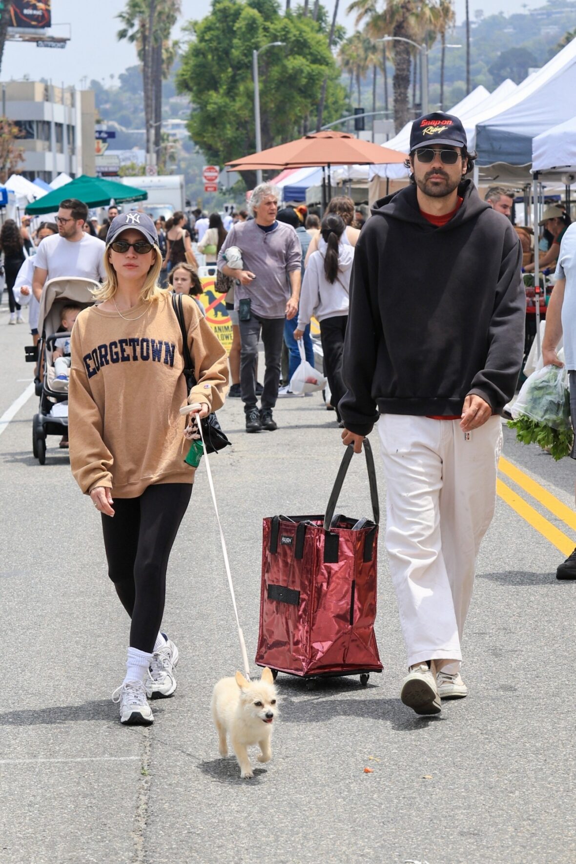 Brittany Snow and Hunter Moreno at a farmers market