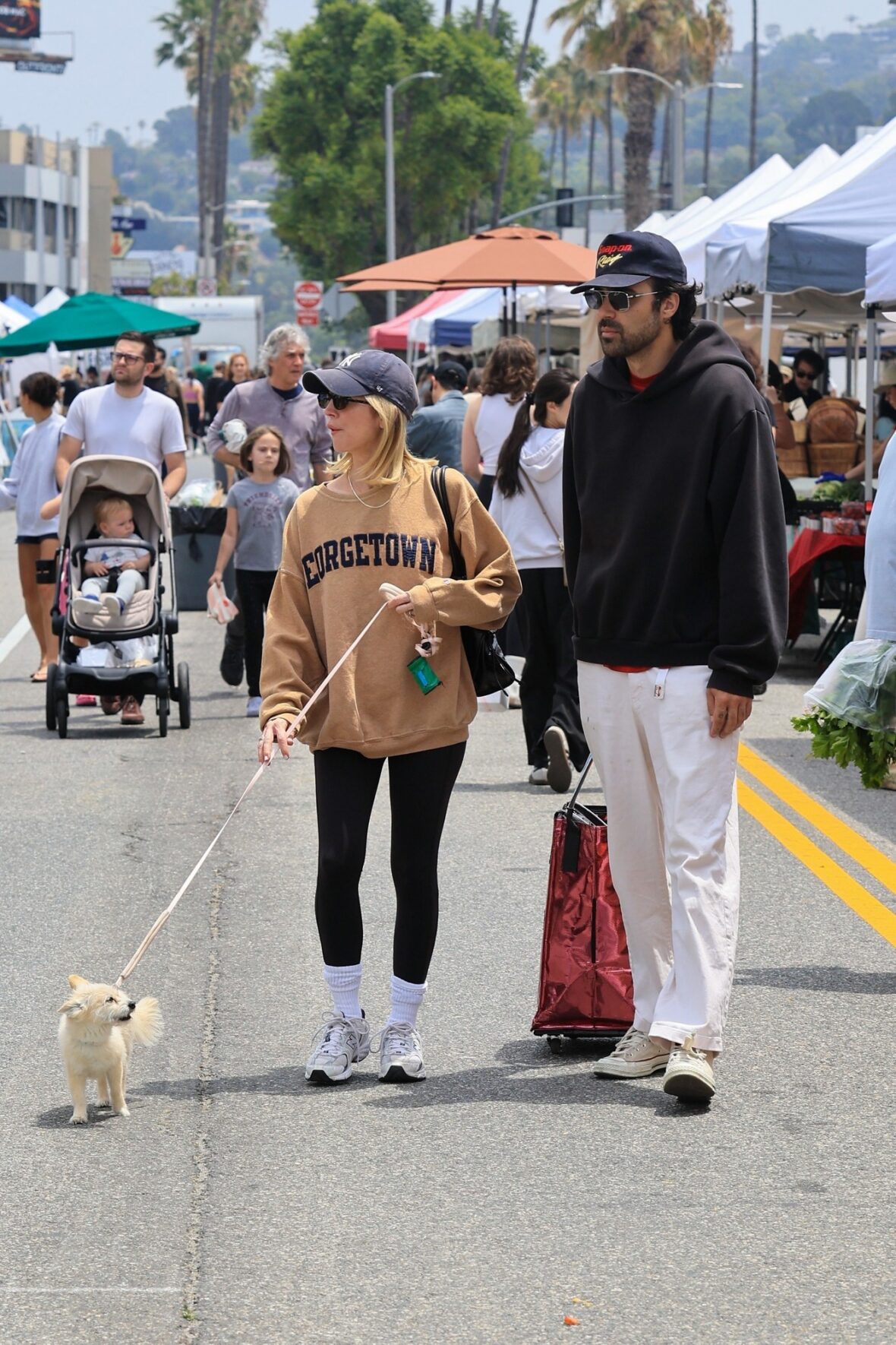 Brittany Snow and Hunter Moreno at a farmers market