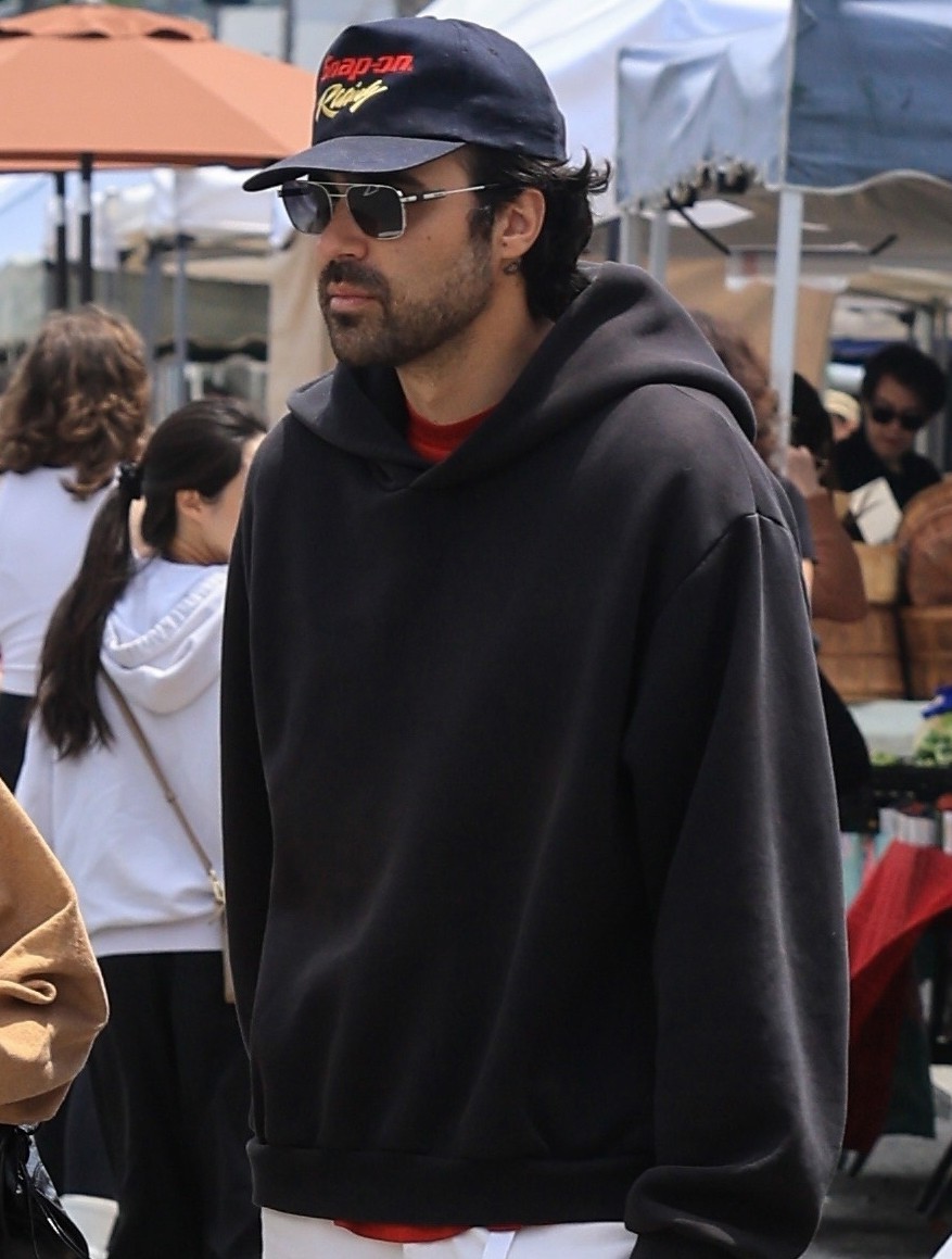 Brittany Snow and Hunter Moreno at a farmers market