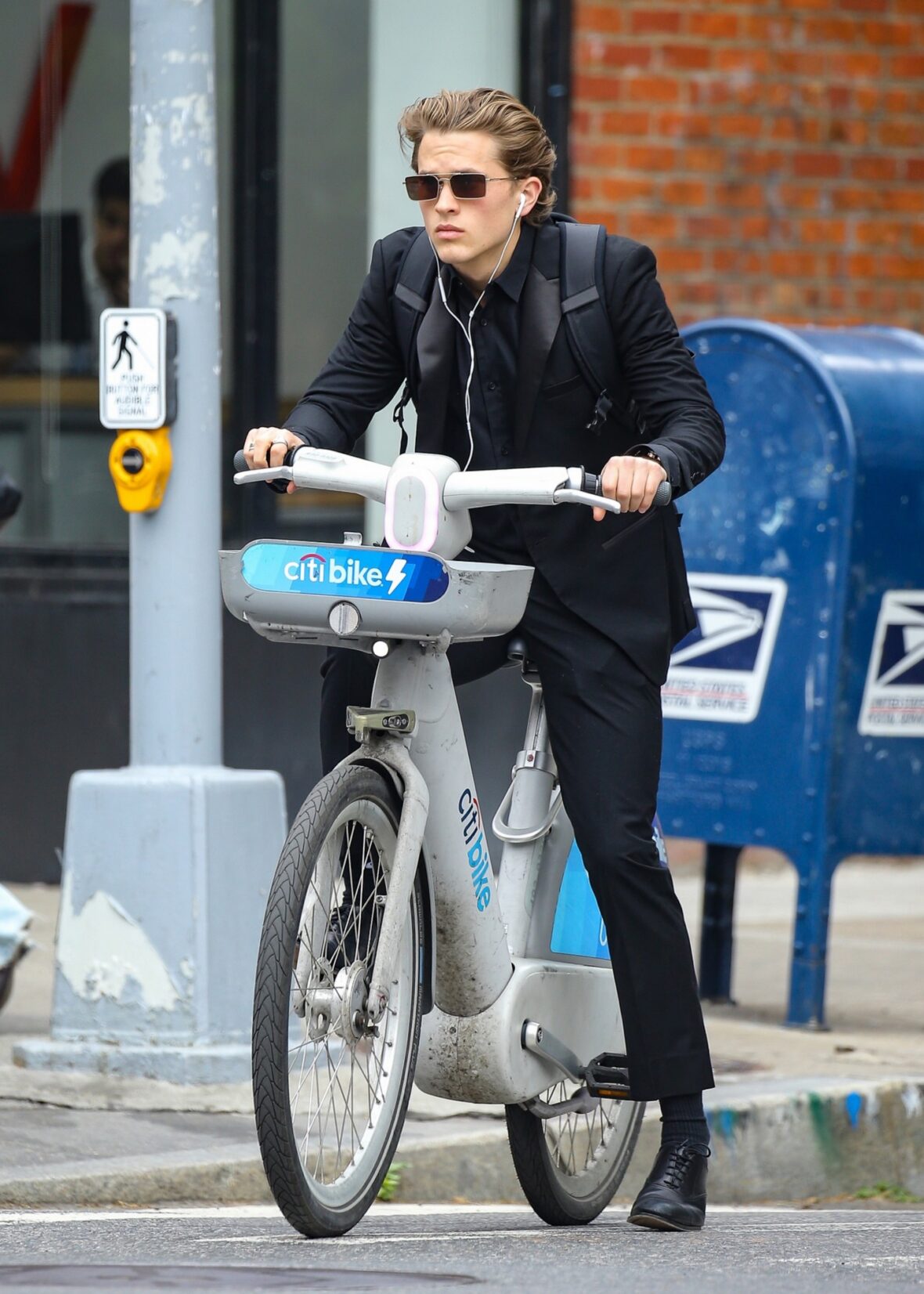 Deacon Phillippe riding a bike in NYC