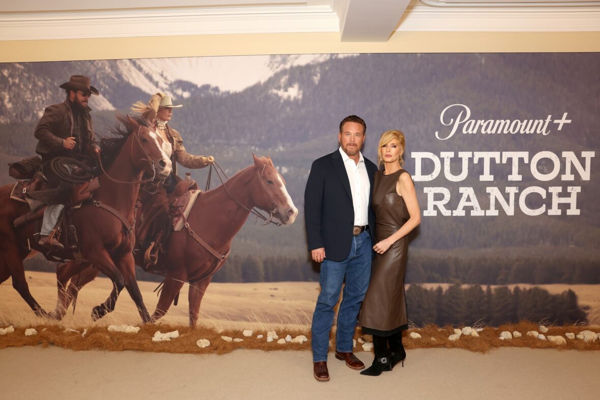 Cole Hauser and Kelly Reilly pose together at the 