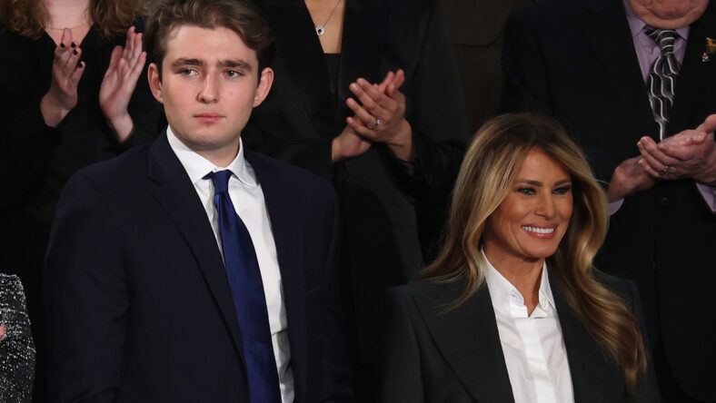 Barron and Melania Trump standing side-by-side in February 2026