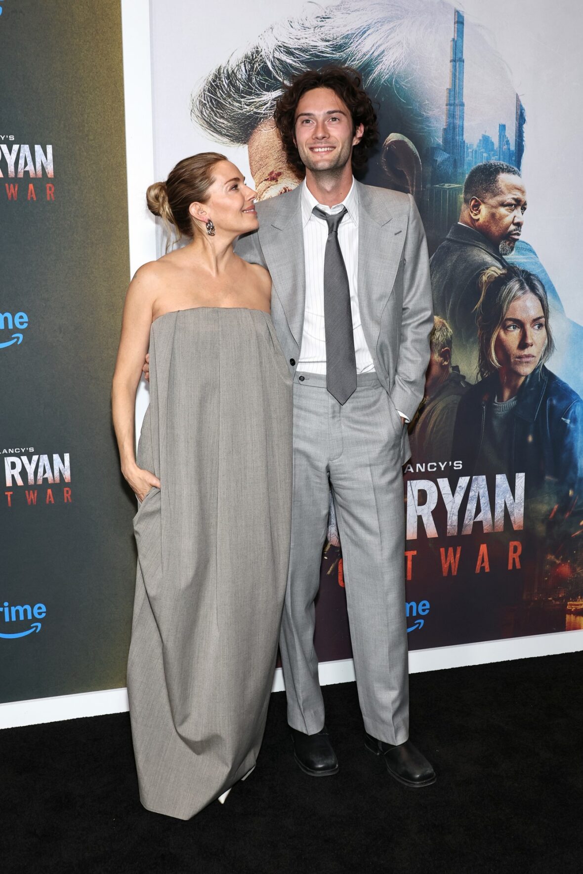 Sienna Miller and Oli Green attend Amazon MGM's "Tom Clancy's Jack Ryan: Ghost War" World Premiere