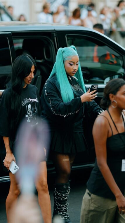 North West alternative fashion portrait North West photographed in a dark outfit with blue hair during the Paris fashion event