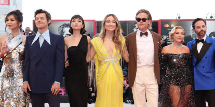 Olivia Wilde with the cast of Don't Worry Darling on a 2022 red carpet