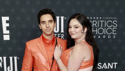 Paul W Downs Meg Stalter in orange 31st Annual Critics Choice Awards - Arrivals