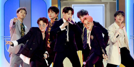 BTS group members performing on stage together