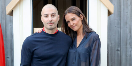 Katie Holmes with her arm around Jason Bard Yarmosky