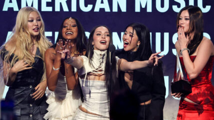 KATSEYE on stage at AMAs