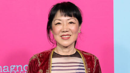 Margaret Cho smiles while posing at the I Want Your Sex premiere