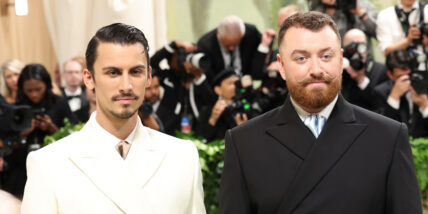 Sam Smith and Christian Cowan at a past Met Gala posing together