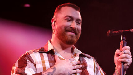 Sam Smith performs on stage during a concert in 2025