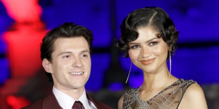 Tom Holland and Zendaya pose together during the Spider-Man press tour