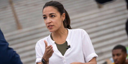 Alexandria Ocasio-Cortez in a stock image, speaking to reporters in Washington, DC