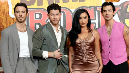Kevin Jonas, Nick Jonas, Demi Lovato, Joe Jonas pose for a group photo at the Camp Rock 3 premiere