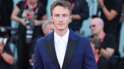 Drew Starkey in a blue suit at the Venice Film Festival.