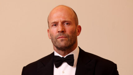 Jason Statham on the red carpet in a tuxedo
