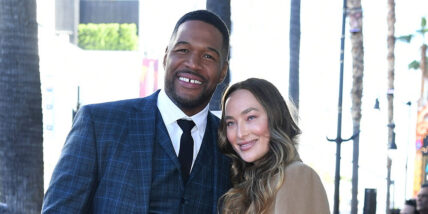 Michael Strahan and Kayla Quick attend The Hollywood Walk of Fame star ceremony honoring Michael Strahan on January 23, 2023 in Los Angeles, California.