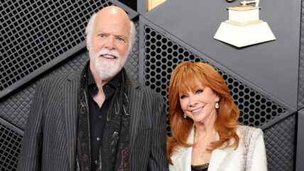 Rex Linn and Reba McEntire pose together at the Grammys