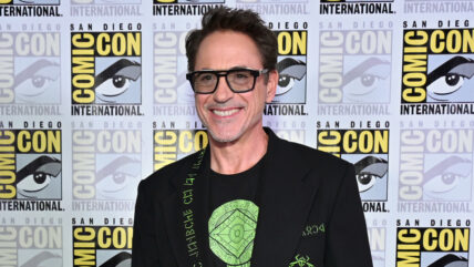 Robert Downey Jr poses at San Diego Comic-Con