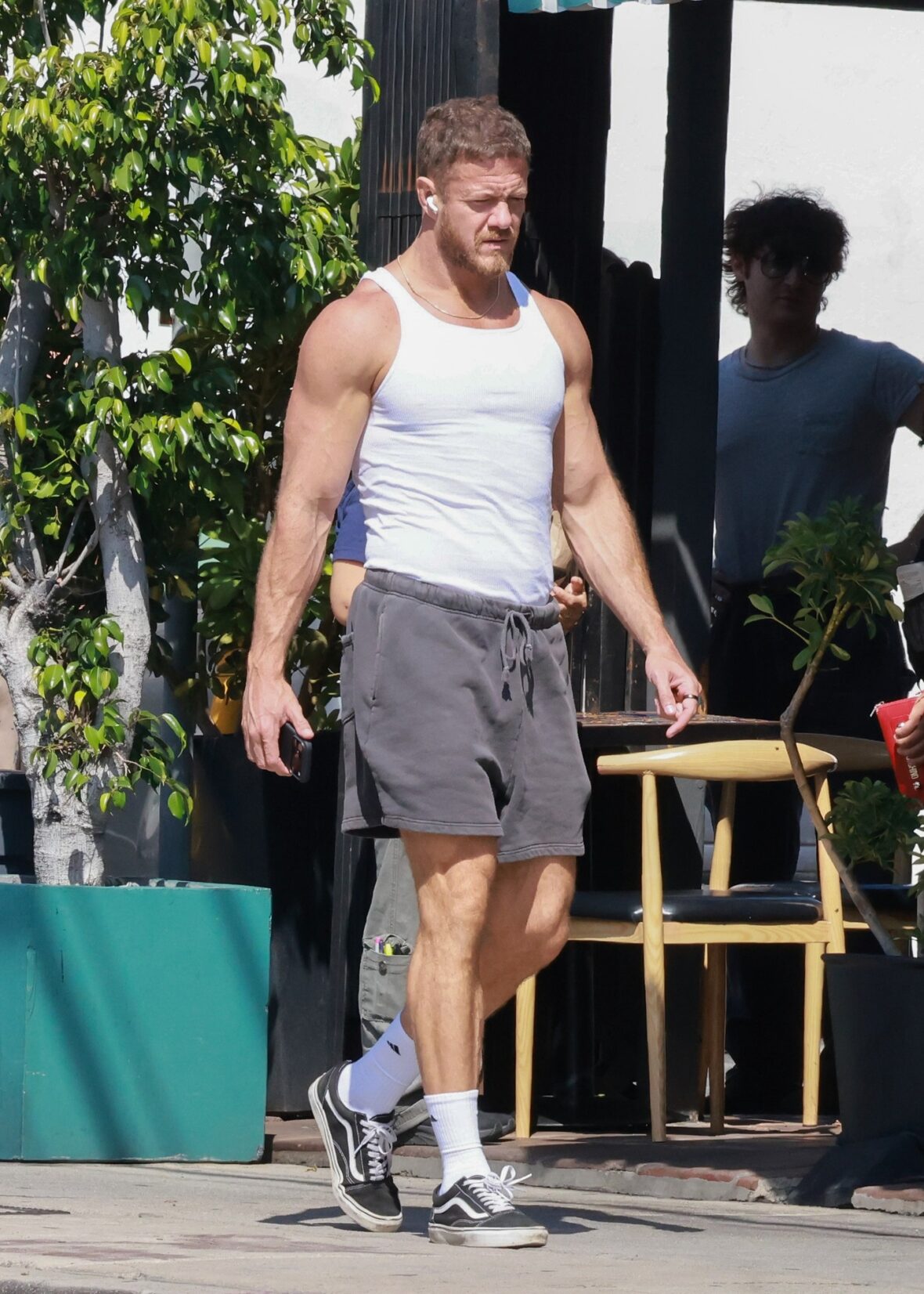 Imagine Dragons frontman Dan Reynolds was looking buff in a white tank top while getting lunch in Los Angeles on Monday.