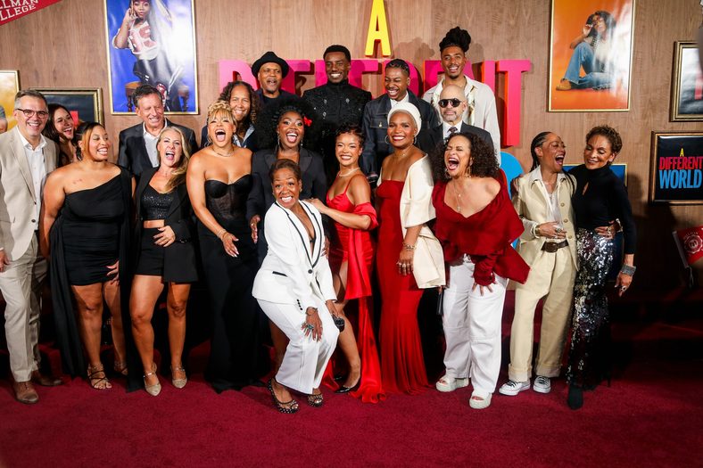 A Different World cast and crew pose for a group photo at the series premiere in Atlanta