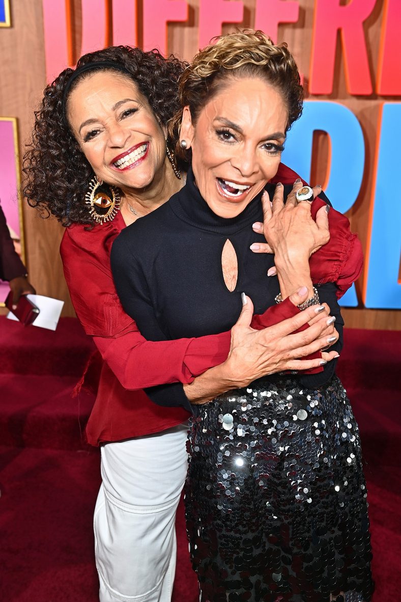 Debbie Allen and Jasmine Guy pose on the red carpet at the A Different World premiere
