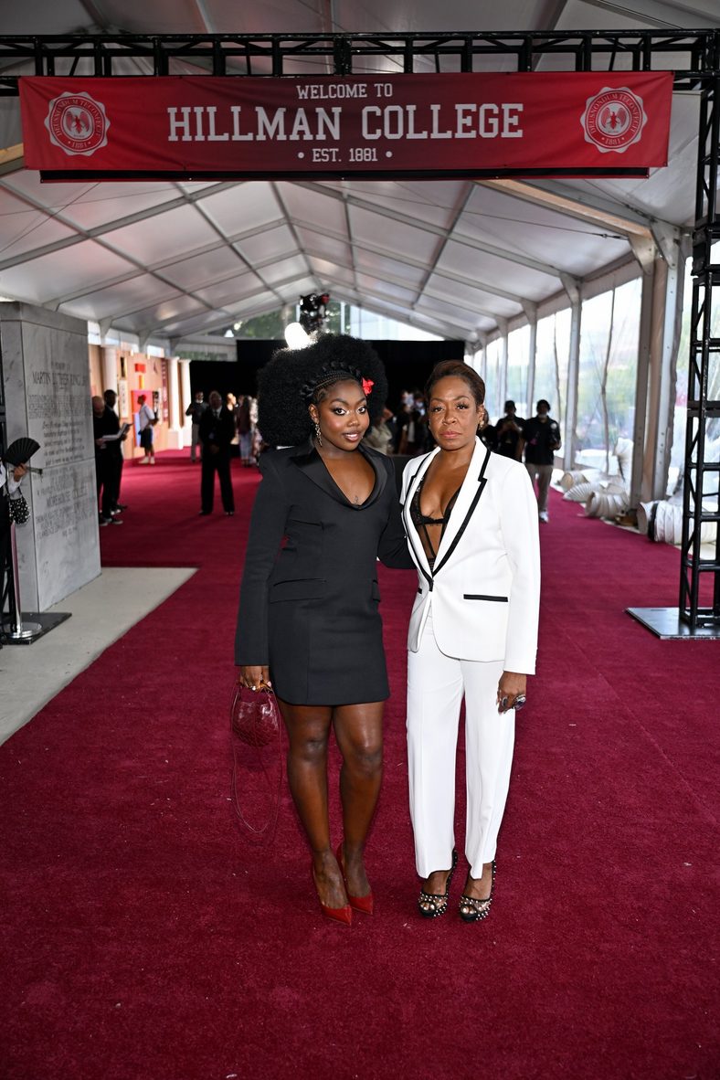 Alijah Kai & Tichina Arnold pose on the red carpet at the A Different World premiere