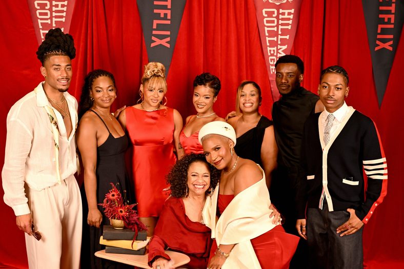 Cast and crew pose for a group photo at the A Different World premiere