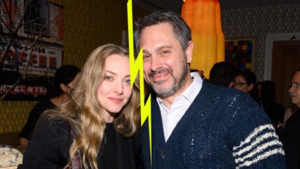 Amanda Seyfried and Thomas Sadoski stock photo with lightning bolt down center