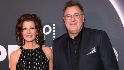 Amy Grant and Vince Gill pose at the Grand Ole Opry 100