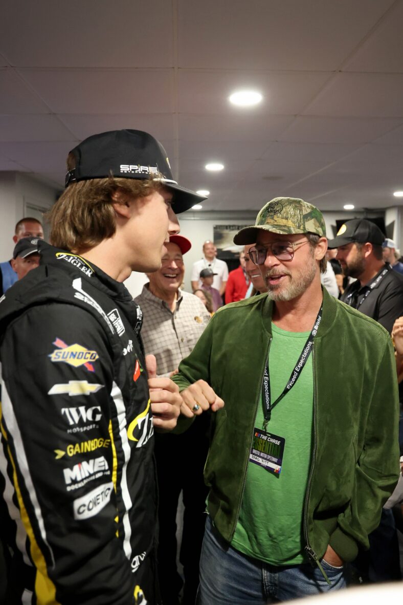 Brad Pitt attends the NASCAR race in Bristol