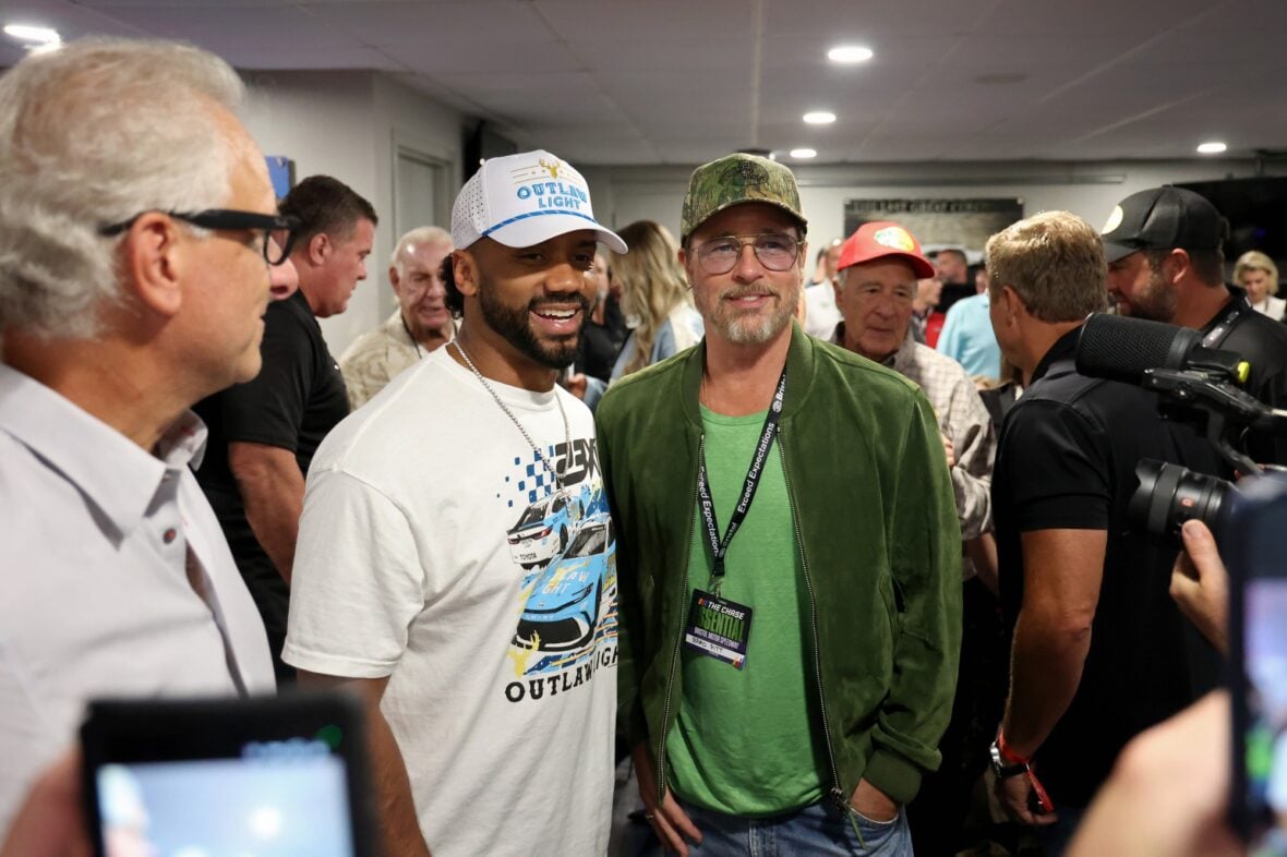Brad Pitt and Russell Wilson attend the NASCAR race in Bristol