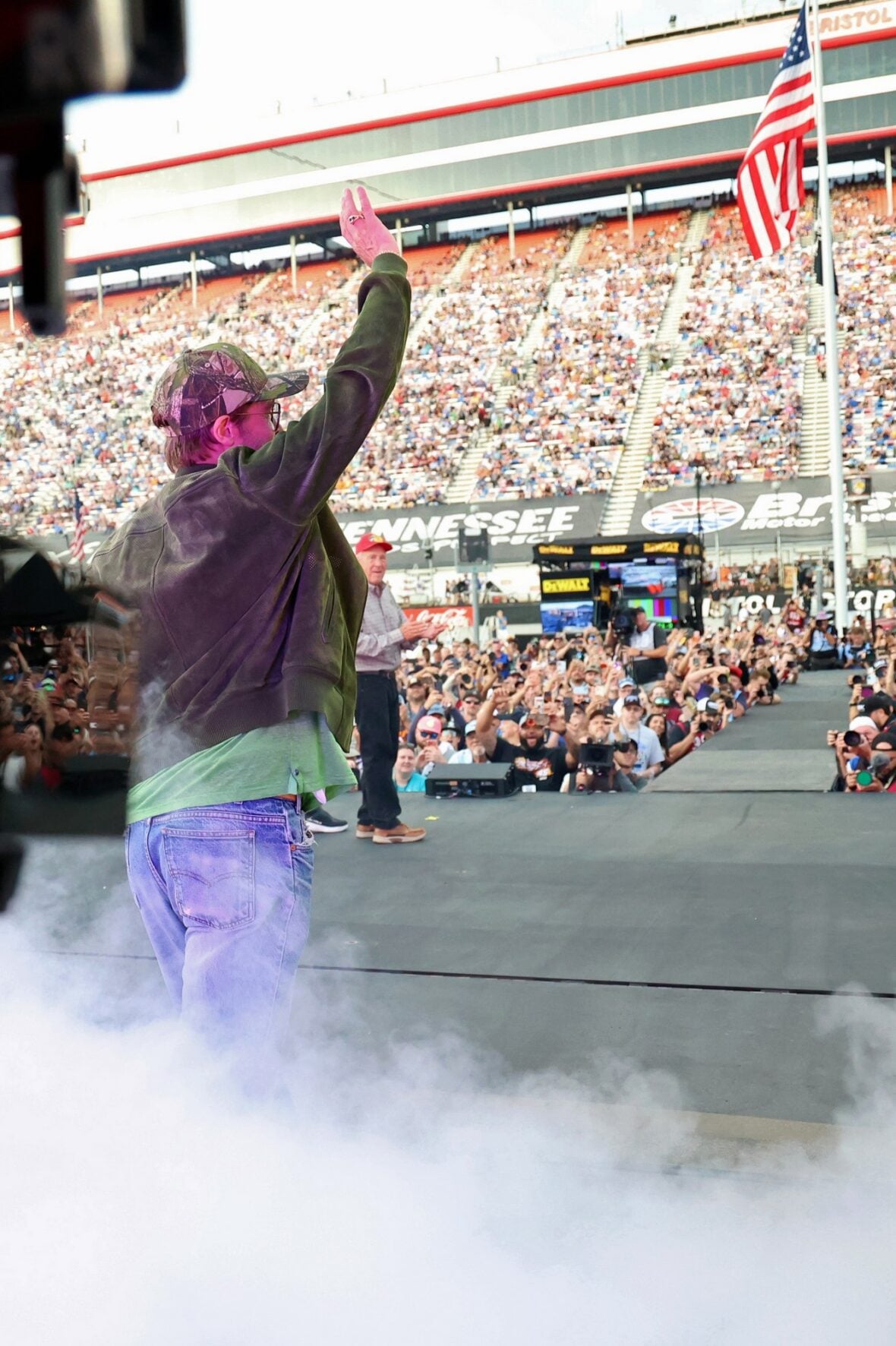 Brad Pitt attends the NASCAR race in Bristol