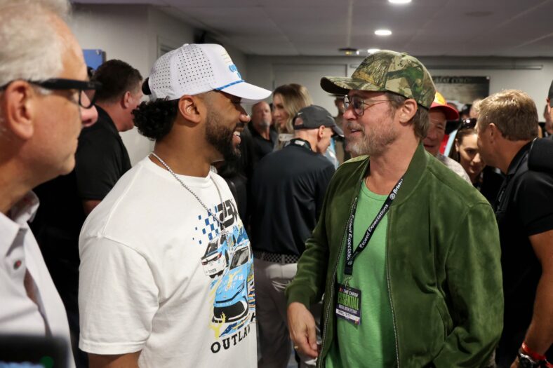 Brad Pitt and Russell Wilson attend the NASCAR race in Bristol