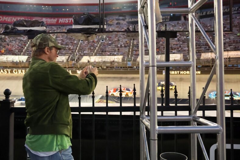 Brad Pitt attends the NASCAR race in Bristol
