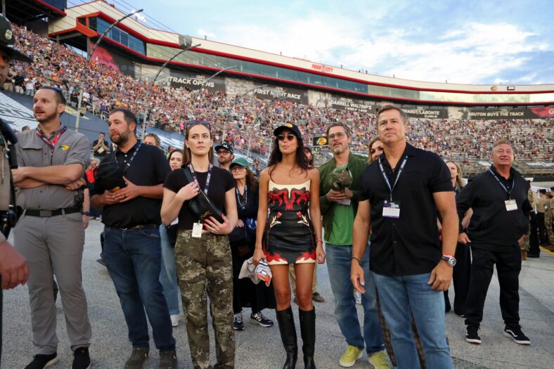Brad Pitt and Ines de Ramon attend the NASCAR race in Bristol
