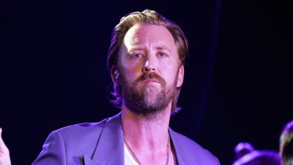 Charles Kelley performs on stage in 2025