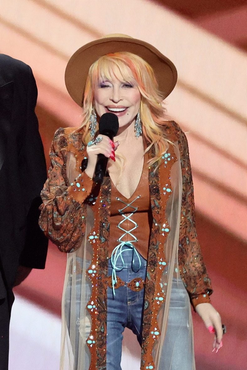 Dolly Parton speaks on stage at the 2023 CMA Awards