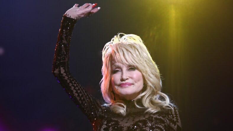 Dolly Parton waving