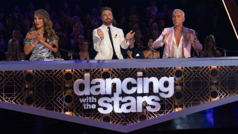 Carrie Ann Inaba, Derek Hough, and Bruno Tonioli at the judges table on DWTS