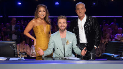Carrie Anne Inaba, Derek Hough, Bruno Tonioli pose for a photo behind the judges panel at Dancing with the Stars