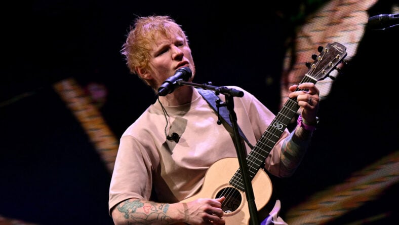 Ed Sheeran performing on stage