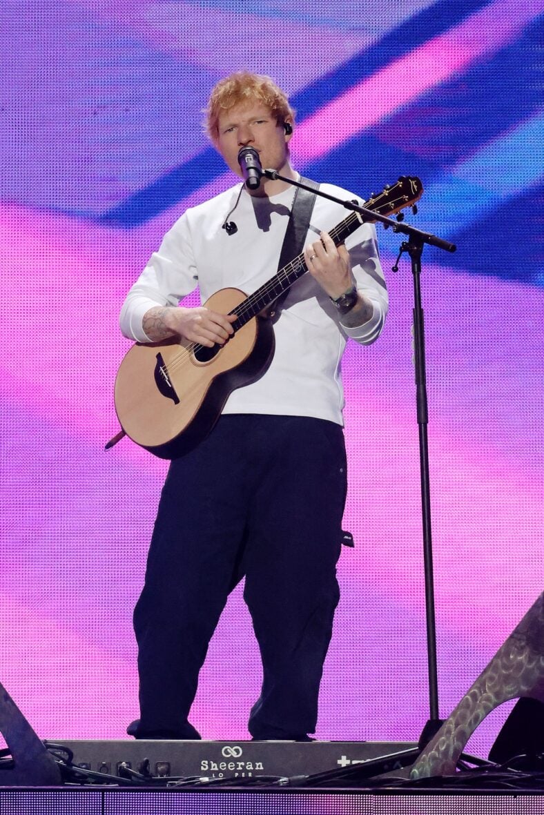 Ed Sheeran performs on stage at iHeartRadio Jingle Ball tour