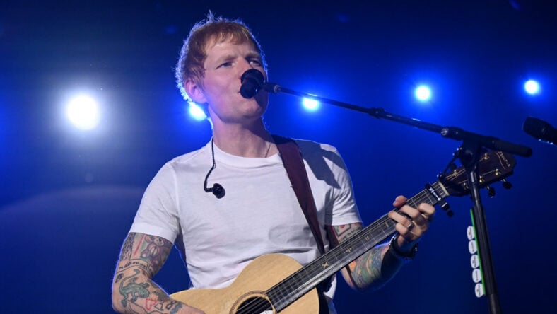 Ed Sheeran performing on stage