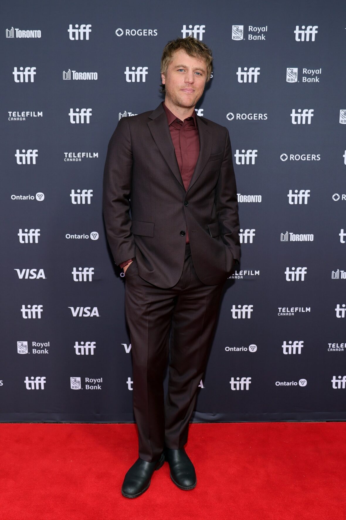 Johnny Flynn poses at Elsinore TIFF premiere