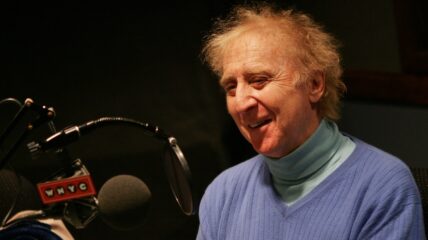 Gene Wilder smiling in front of camera