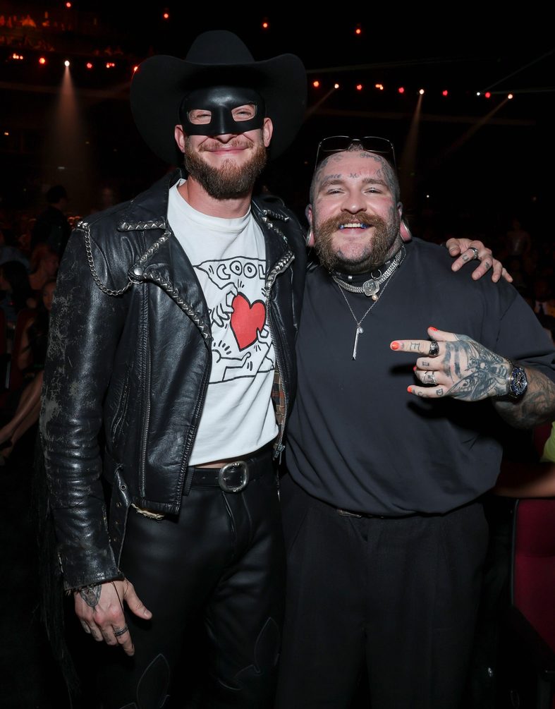 Orville Peck and Teddy Swims pose at the 2026 MTV VMAs