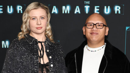 jacob Batalon and Veronica Leahov attend "The Amateur" World Premiere